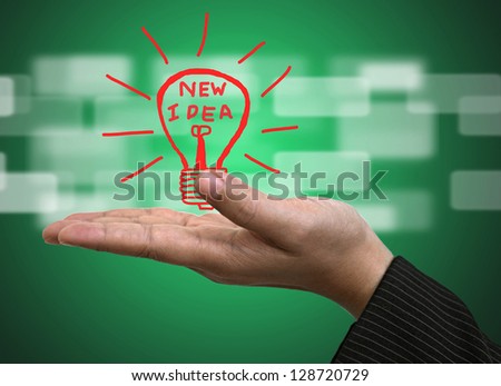 Light bulb on Business hand for New Idea Innovation Concept