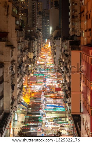 Aerial View of Temple street night flea market illumination in Kowloon Hong Kong