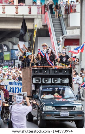 BANGKOK,THAILAND- JUNE 30 : Unidentified protesters, V for Thailand group, wear Guy Fawkes masks to protest government corruption on June 30,2013 in Bangkok,Thailand.