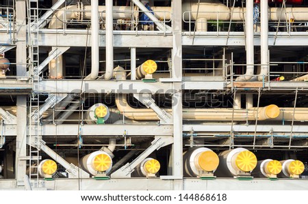 Assembling of liquefied natural gas Refinery Factory with LNG storage tank using for Oil and gas industry background