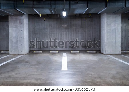 empty Parking garage underground, interior shopping mall at night