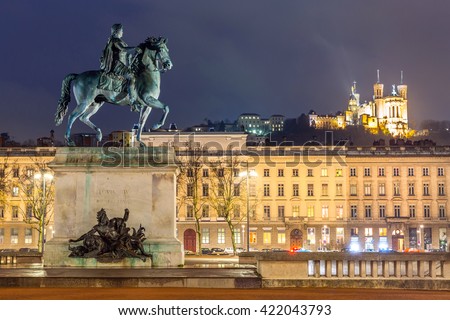 Lyon Place Bellecour statue of King Louis XIV at night France