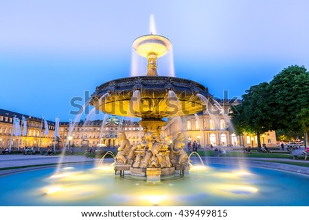 Fountain at neues Schloss New palace in Stuttgart city center, Germany at dusk