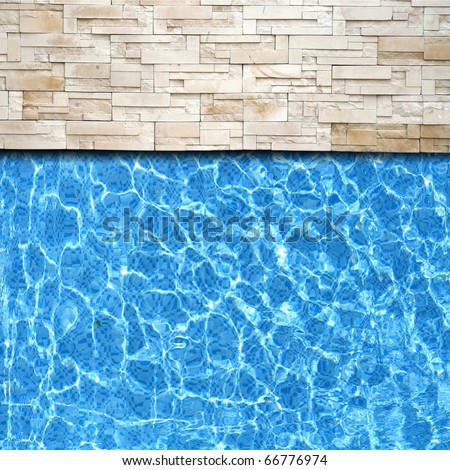Refection of Blue water in Swimming pool with Ripple and modern brick pavement