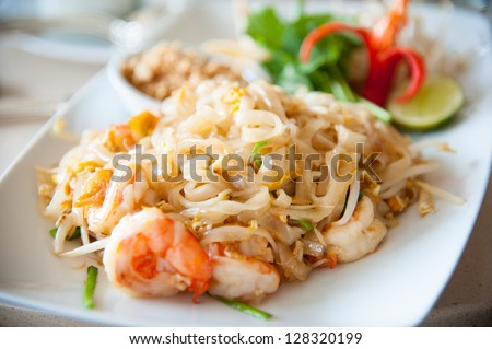 Thailand\'s national dishes, stir-fried rice noodles with egg, vegetable and shrimp (Pad Thai)