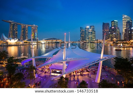 Cityscape of Singapore night in twilight time : Marina Bay view from Esplanade