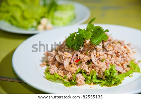 Larb chicken salad. Traditional Thai food, with ground chicken lime, chili and herbs. This food is popular in the north-east of the country (Isaan)