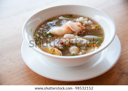 Seafood paste of rice flour (noodle) with egg, shrimp, mantis shrimp, squid and vegetables : delicious Thailand and Vietnam food