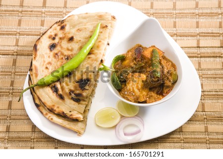 Paneer Butter Masala or Cheese Cooked with Capsicum with Pratha, Indian Dish