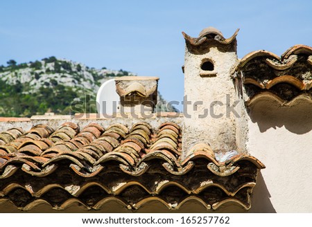 Ancient clay pipe roof tiles on French homes