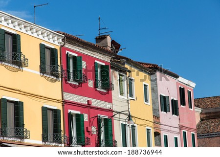 A row of brightly colored homes in Burano, Italy