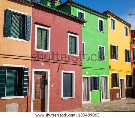 A row of brightly colored homes in Burano, Italy