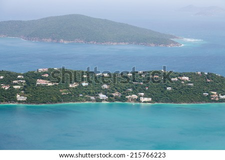 Luxury vacation homes along strip of land on the shore of Megan\'s Bay in St Thomas