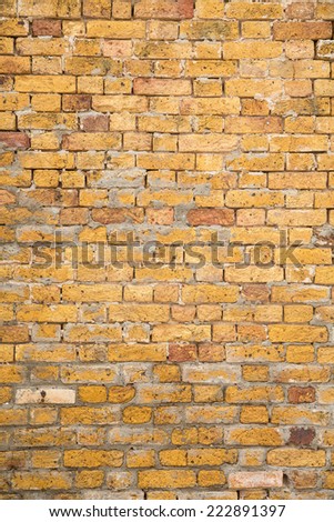 Old Yellow Brick and Mortar Wall for background or texture
