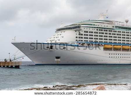 View of balconies and side of a luxury cruise ship in the Caribbean