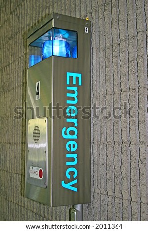 Emergency call box on wall in parking garage