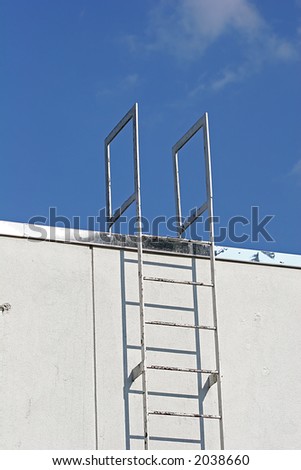 Industrial ladder to roof on back of restaurant