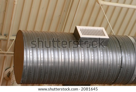 Open aluminum ductwork on ceiling of restaurant