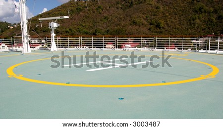 Landing pad for a helicopter on the bow of a ship