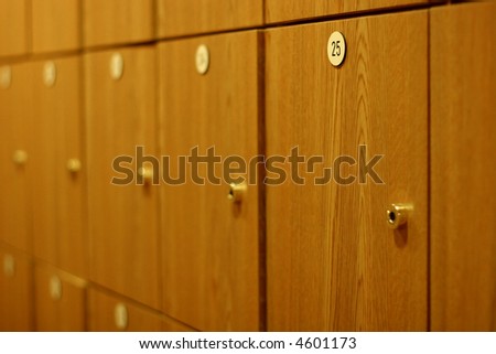 Sequentially numbered wooden lockers in a gym