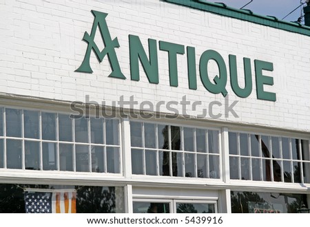 Old antique store with American flag in window
