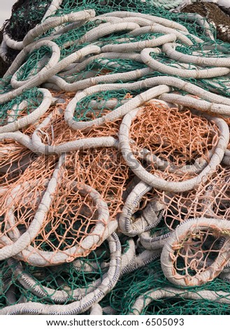 A pile of nets thrown from a fishing boat