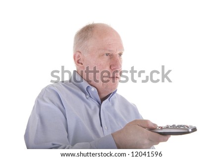 An older guy in a blue dress shirt working a remote control toward copy space
