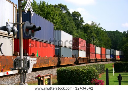 Freight Train across railroad crossing