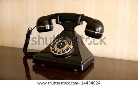 An early model phone beween rotary and push button technology