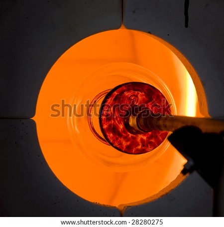 Molten hot glass in a glass blowing oven