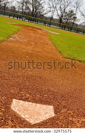 A baseball base in a newly planted and landscaped sports field
