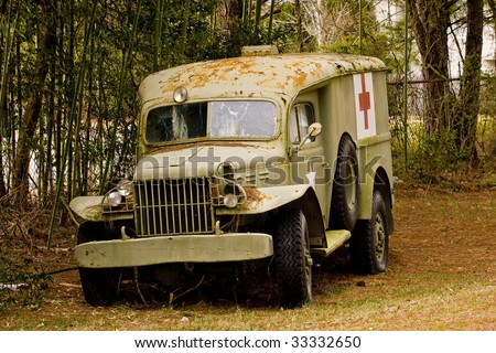 An old US Army medic truck that has been shot up