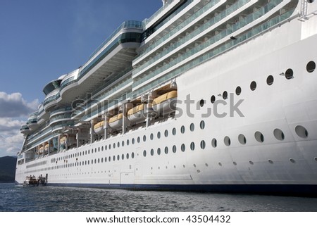 Side of a luxury cruise ship shot from water level
