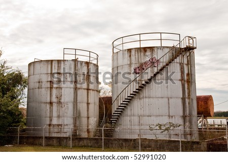Old Storage Tanks with stairs leading to top