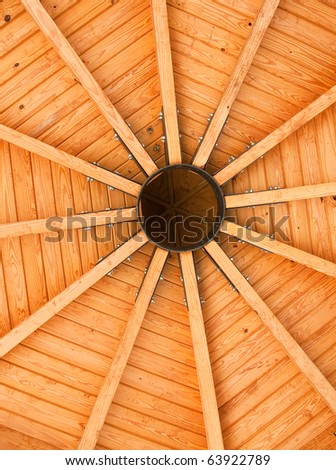 Wood Trusses radiating from center of a wooden roof