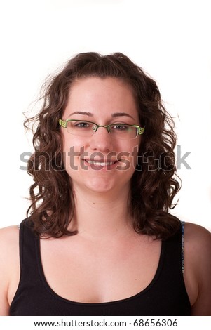 A young brunette woman smiling in a black tank top and glasses