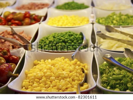 Fresh green and  yellow vegetables on a salad bar