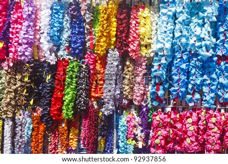 A market with hundreds of many colored hair ribbons