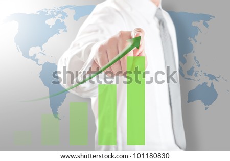 Business man pointing rising chart with world map in background for business growth concept