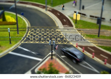 street crossing with tram and bicycle lane