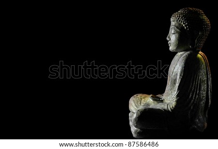 profile silhouette of Buddha with black background