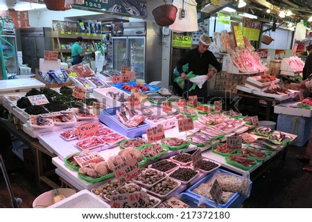 TOKYO JAPAN - APRIL 15 : Fish shop in Ameyoko Street in Ueno district taken April 15, 2014 in Tokyo, Japan.