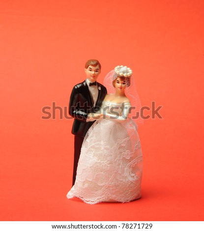 stock photo wedding doll on red background