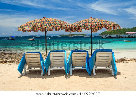 Umbrellas With Beach Chairs  Sea View