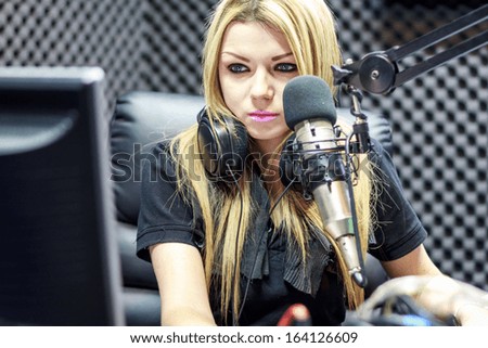 Beautiful Woman Working As Radio DJ Live In Studio
