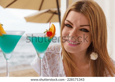 Woman And Cocktail On The Beach With Sea View