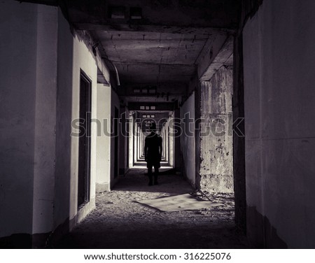 Ghost Hunter At Abandoned Apartment Corridor