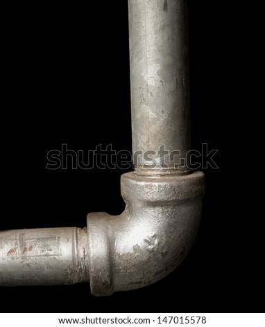 90 elbow galvanized steel pipe on black background