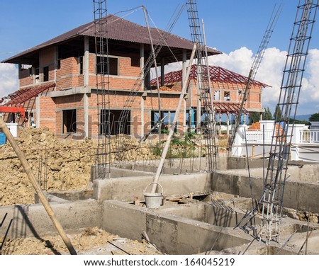 Under-construction concrete house building
