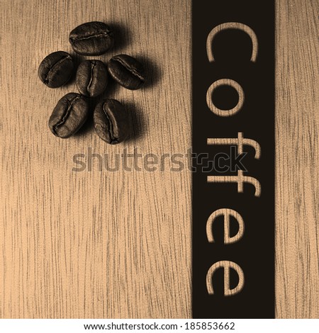 Coffee word banner with Roasted Coffee Beans on wood texture table